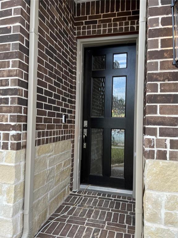 15707 Autumn Sun Conroe, TX 77302 - Photo 2 of 15 a view of a door of the house