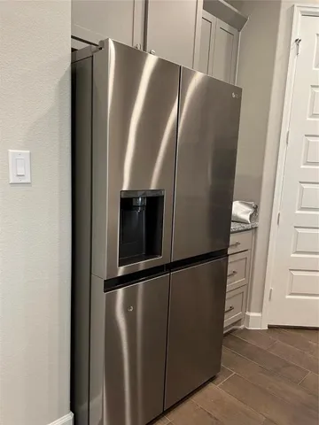 a stove top oven sitting inside of a kitchen