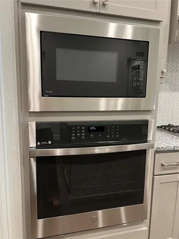 a close view of kitchen countertops with stove