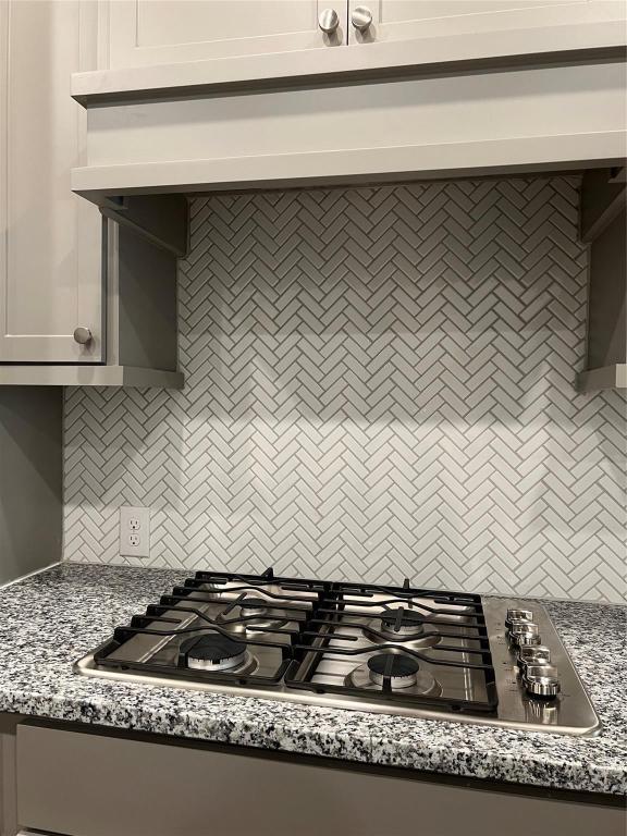 15707 Autumn Sun Conroe, TX 77302 - Photo 10 of 15 a close view of kitchen countertops with stove