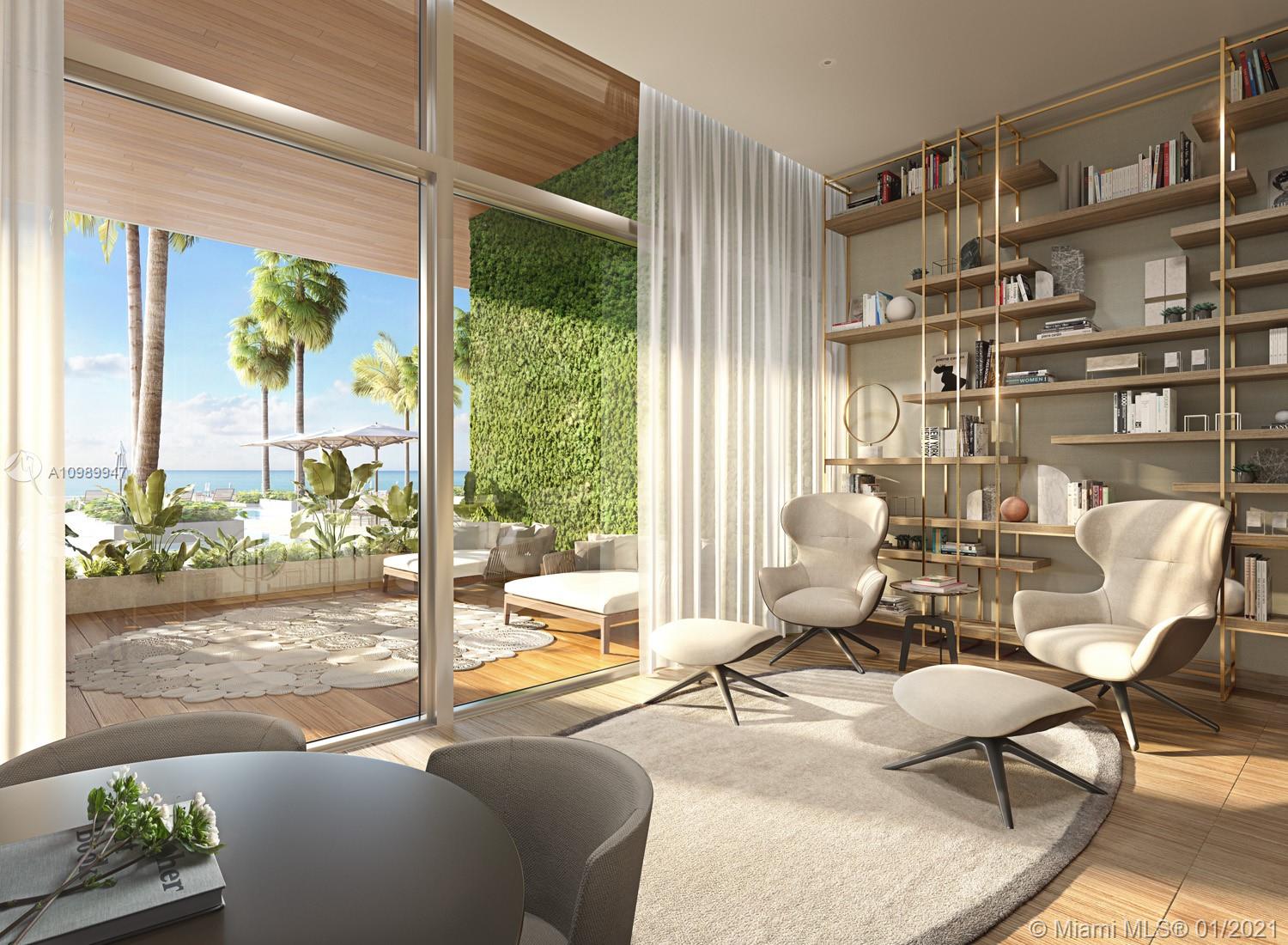 5775 Collins Avenue, Unit PH Miami Beach, FL 33140 - Photo 11 of 23 a living room with furniture and a floor to ceiling window