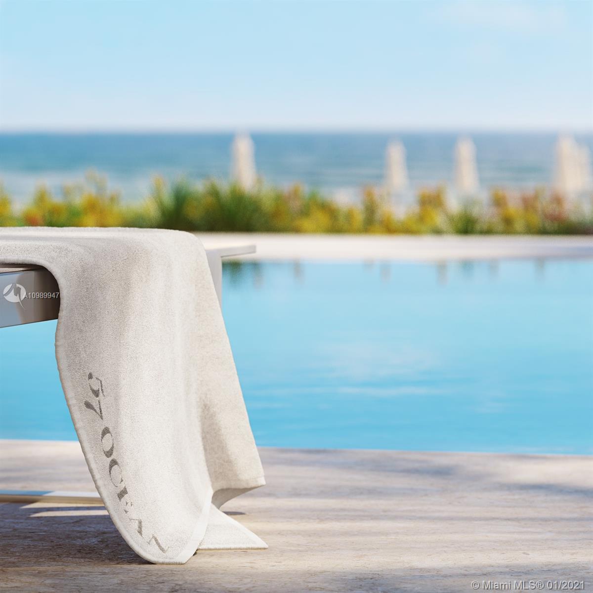 5775 Collins Avenue, Unit PH Miami Beach, FL 33140 - Photo 18 of 23 a view of a lake with houses in the back