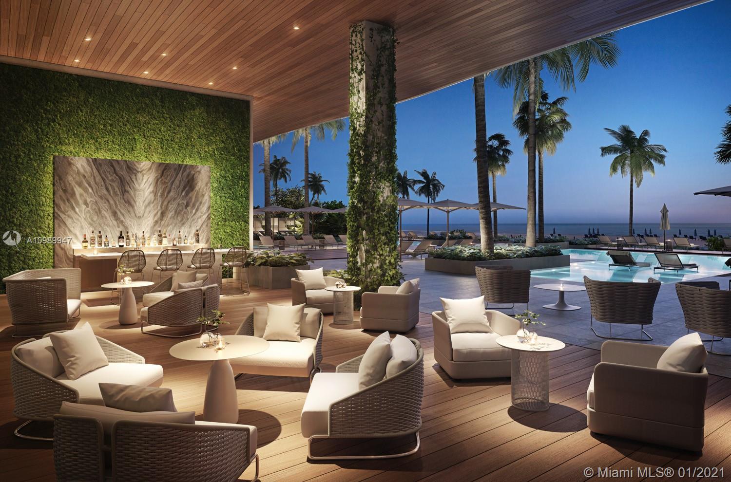 5775 Collins Avenue, Unit PH Miami Beach, FL 33140 - Photo 20 of 23 a living room with furniture and a large window