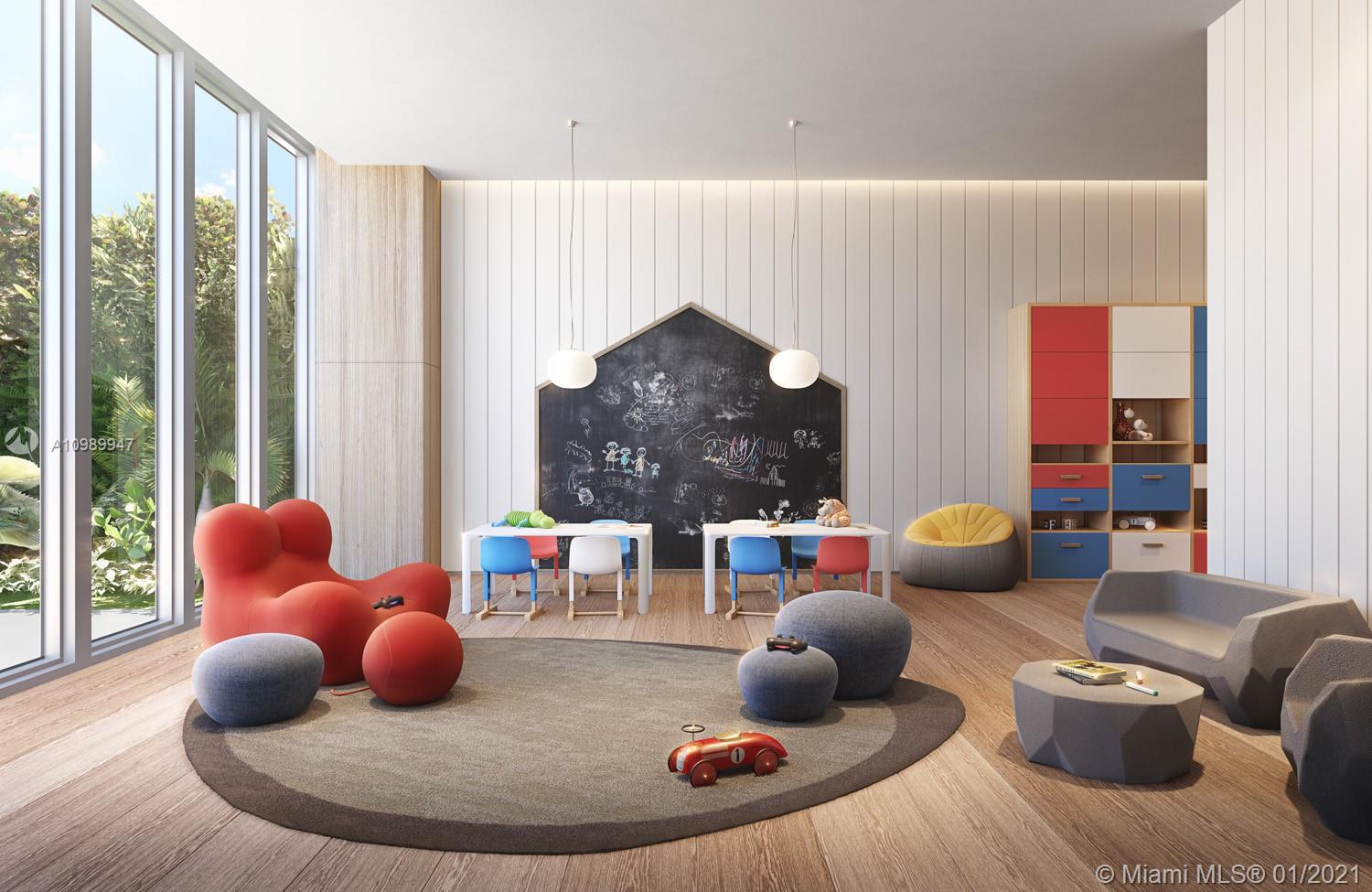 5775 Collins Avenue, Unit PH Miami Beach, FL 33140 - Photo 5 of 23 a living room with furniture and a large window