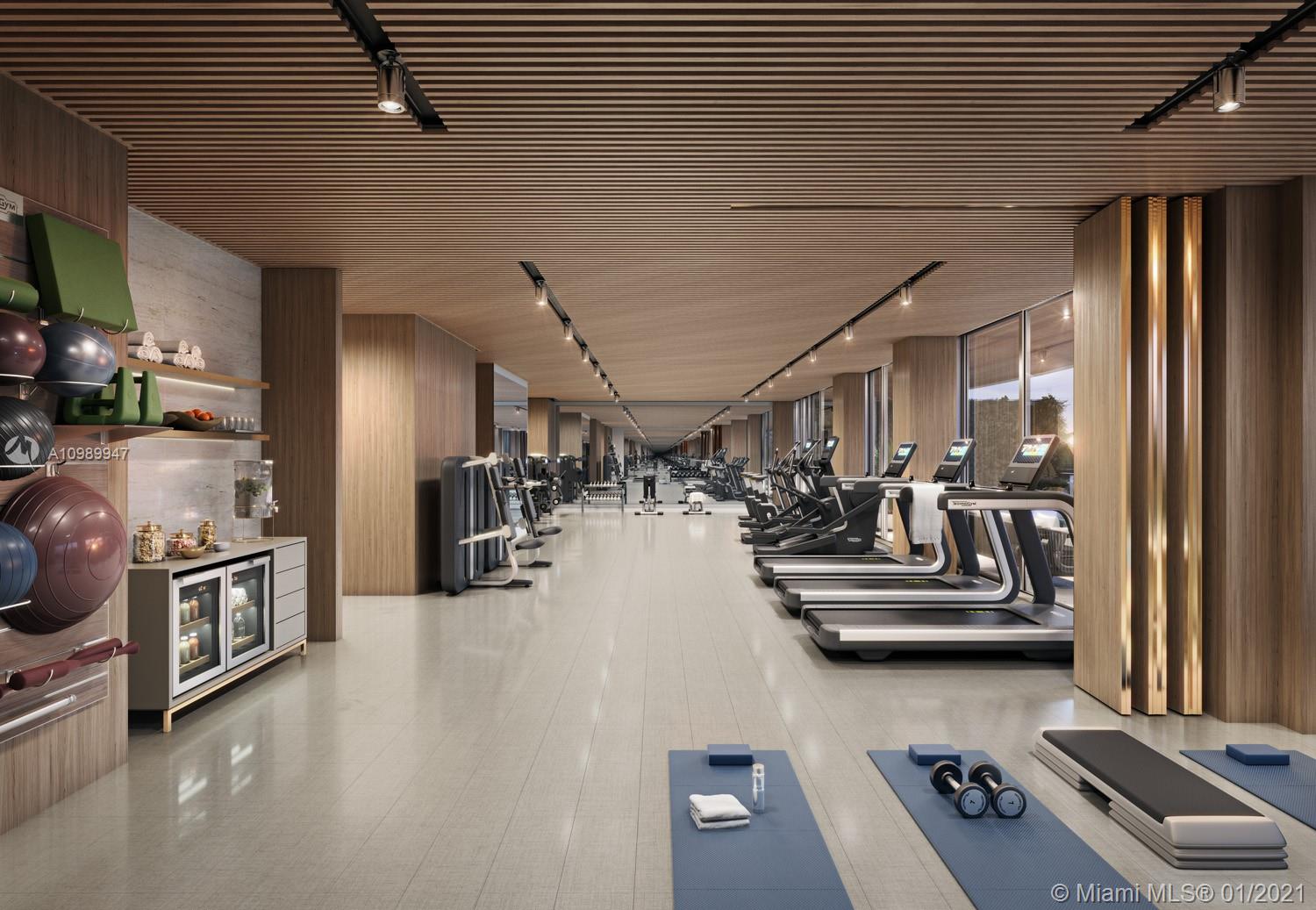 5775 Collins Avenue, Unit PH Miami Beach, FL 33140 - Photo 7 of 23 a view of a room with gym equipment