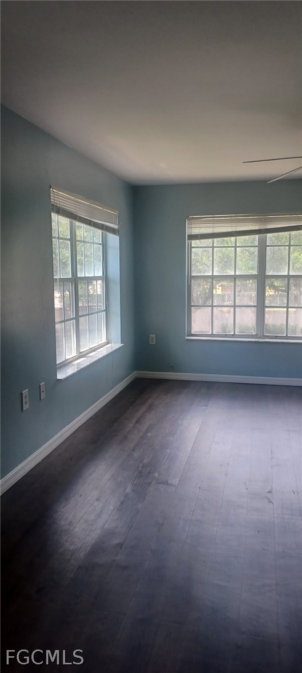 1328 Reflections Way, Unit 1 Immokalee, FL 34142 - Photo 8 of 8 an empty room with a window