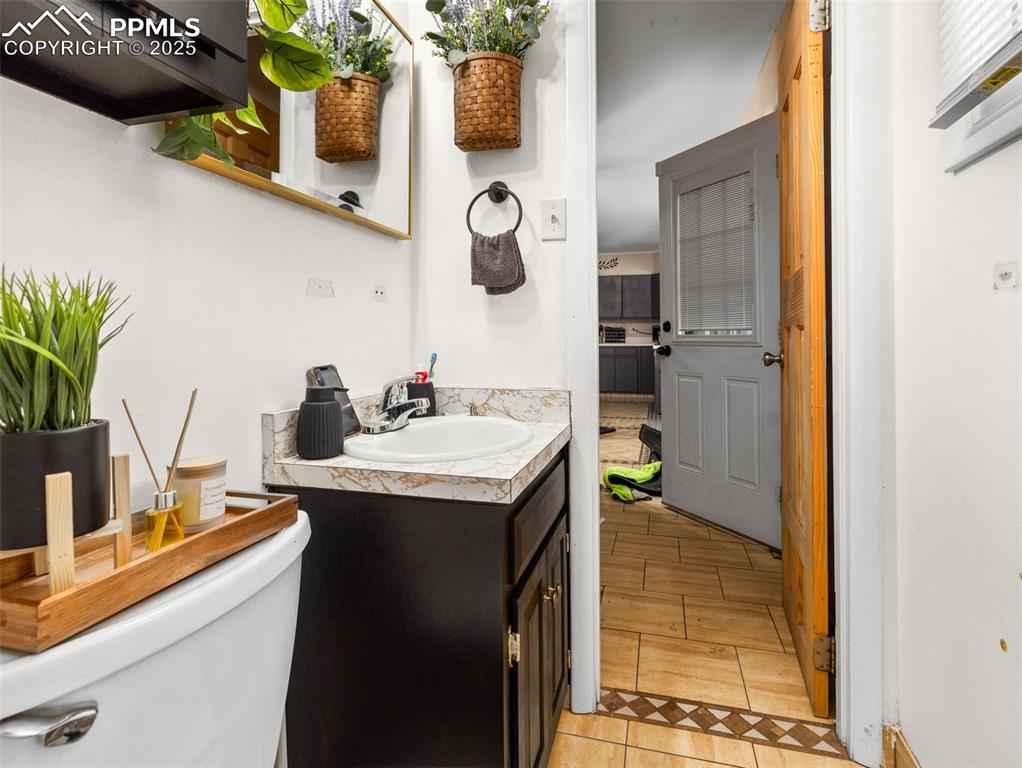 2123 Ridgewood Lane Pueblo, CO 81005 - Photo 13 of 19 a kitchen with a sink and cabinets