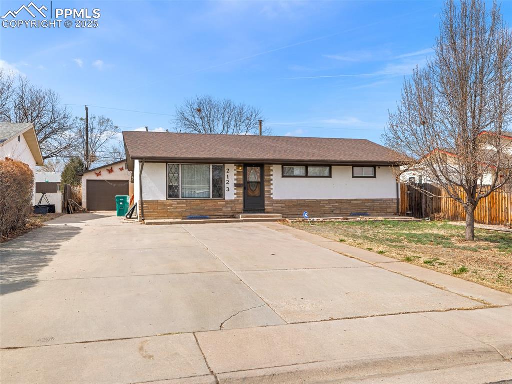 2123 Ridgewood Lane Pueblo, CO 81005 - Photo 2 of 19 a front view of a building with