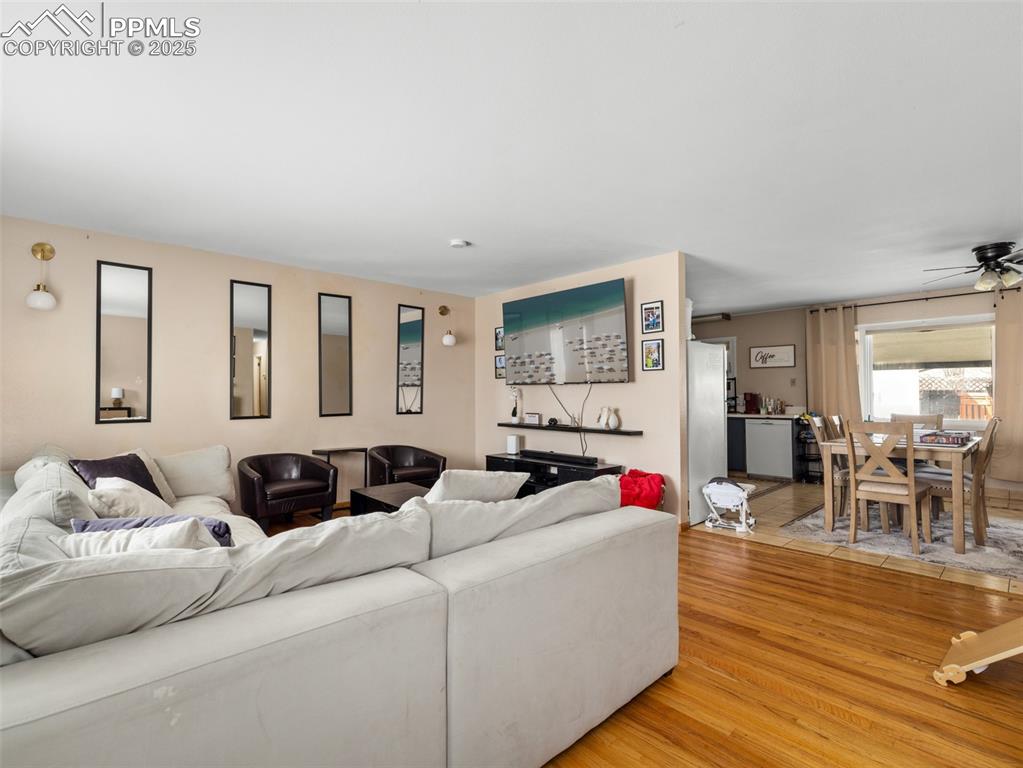 2123 Ridgewood Lane Pueblo, CO 81005 - Photo 3 of 19 a living room with furniture and a flat screen tv