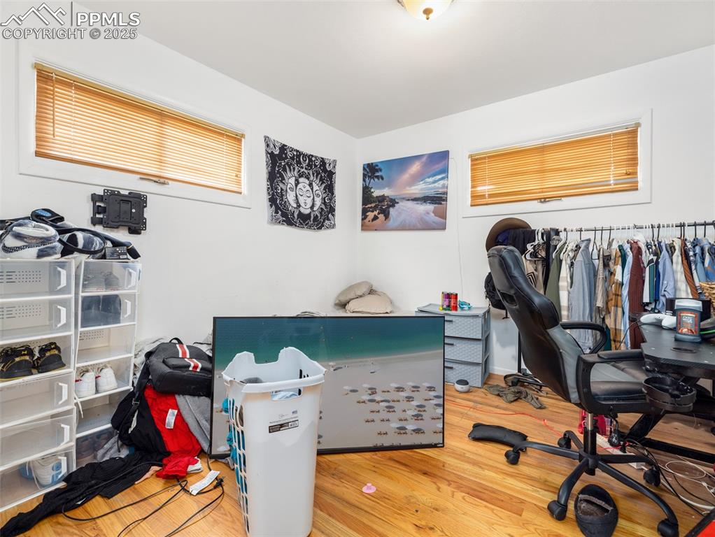 2123 Ridgewood Lane Pueblo, CO 81005 - Photo 10 of 19 a view of walk in closet with clothes and shoes