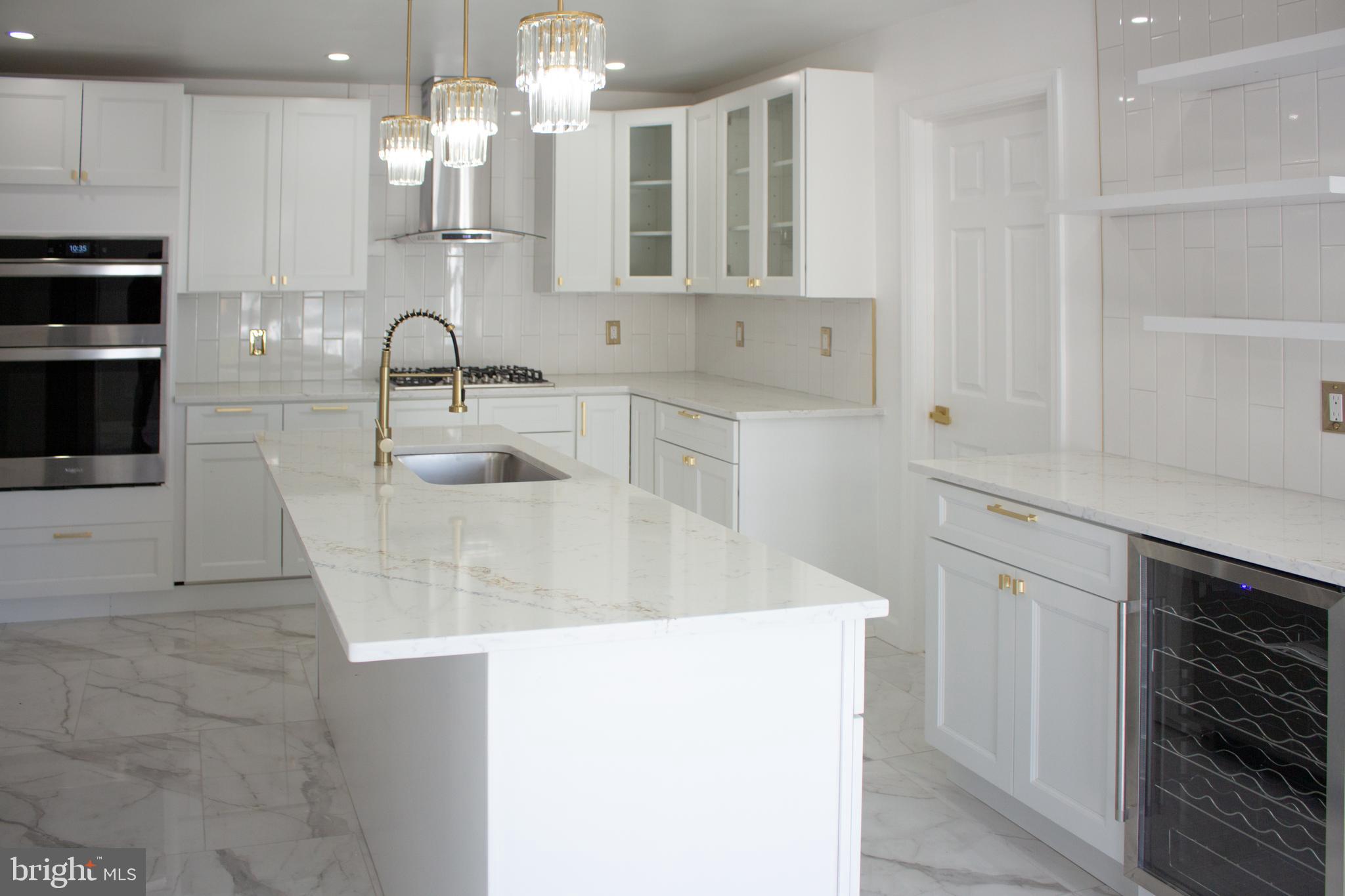 124 Warwick Road Lawnside, NJ 08045 - Photo 7 of 34 Wonderful Kitchen with a spiffy wine fridge