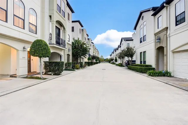 a view of a street with buildings