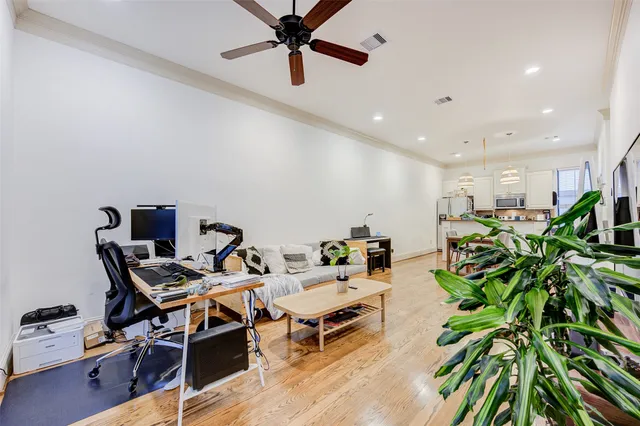 a living room with patio furniture