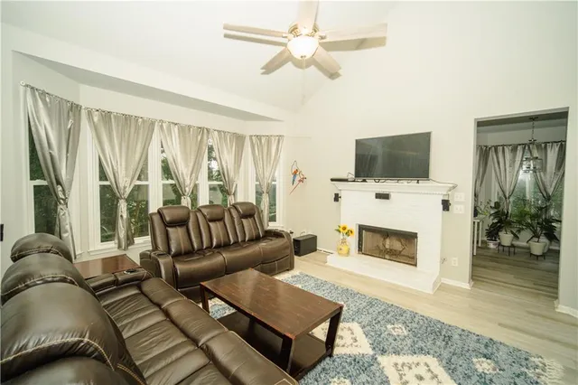 a view of a living room with furniture