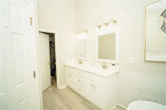 a kitchen with a white stove top oven and refrigerator