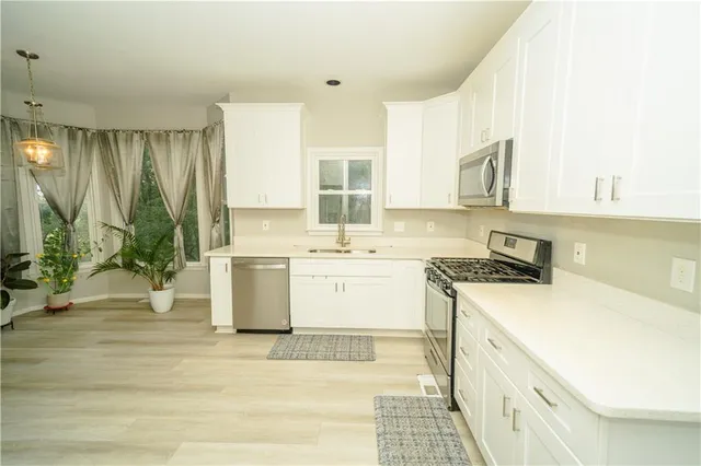 a spacious bathroom with a shower