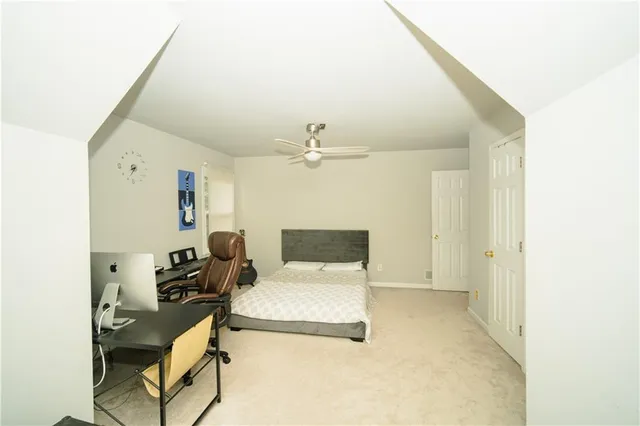 a bathroom with a toilet a sink and bathtub