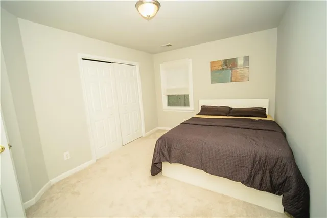 a kitchen with a sink stove and microwave