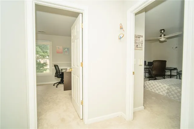 a kitchen with a sink a stove and a refrigerator