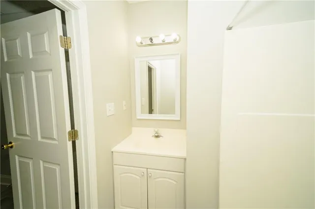 a view of a house with swimming pool and sitting area