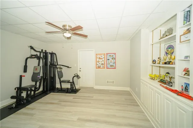 a view of a deck with a yard