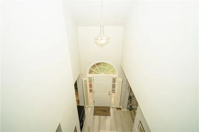 a view of a hallway with staircase