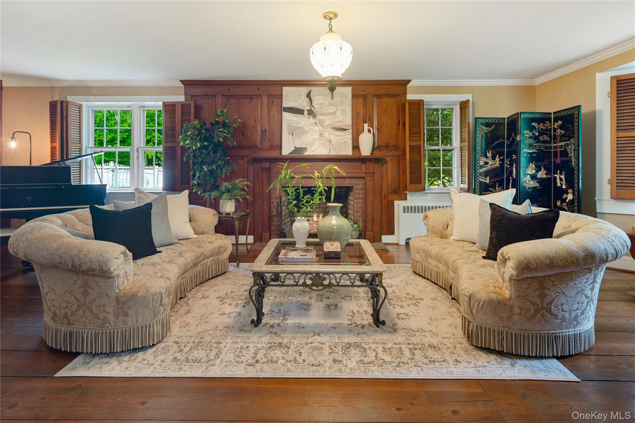 36 Granite Springs Road Granite Springs, NY 10527 - Photo 13 of 49 a living room with furniture a large window and a chandelier