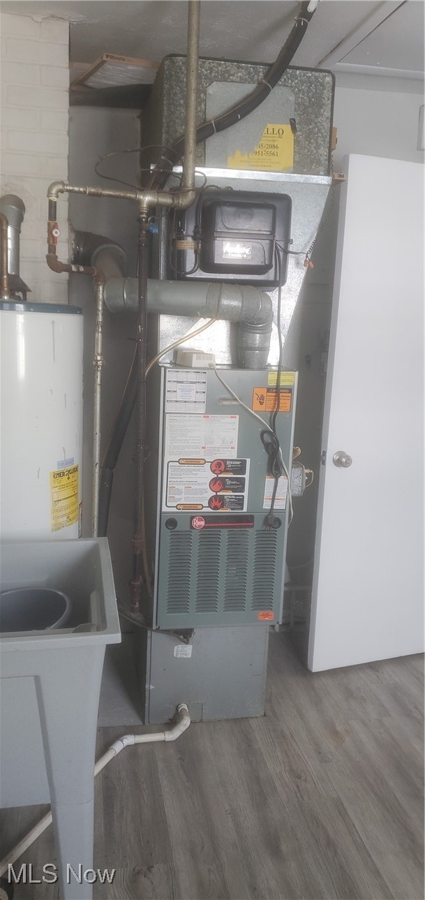 30151 Regent Road Wickliffe, OH 44092 - Photo 13 of 17 Utility room featuring water heater