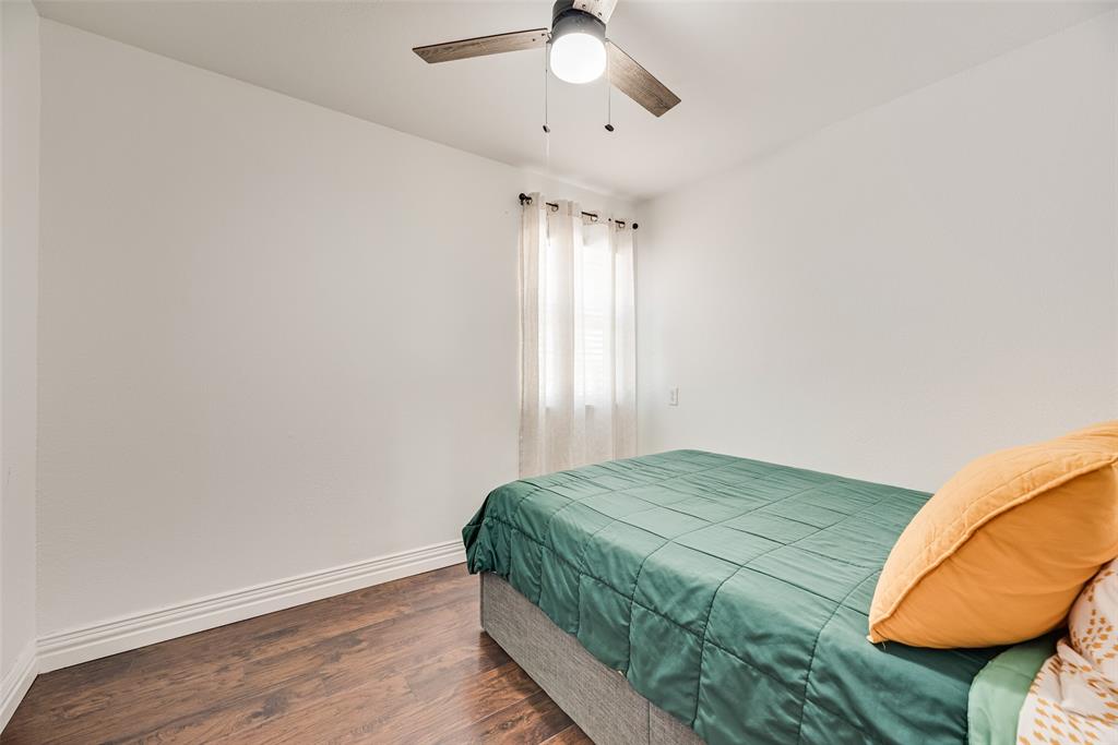 1624 Cemetery Road Royse City, TX 75189 - Photo 13 of 40 a bedroom with a bed and a window
