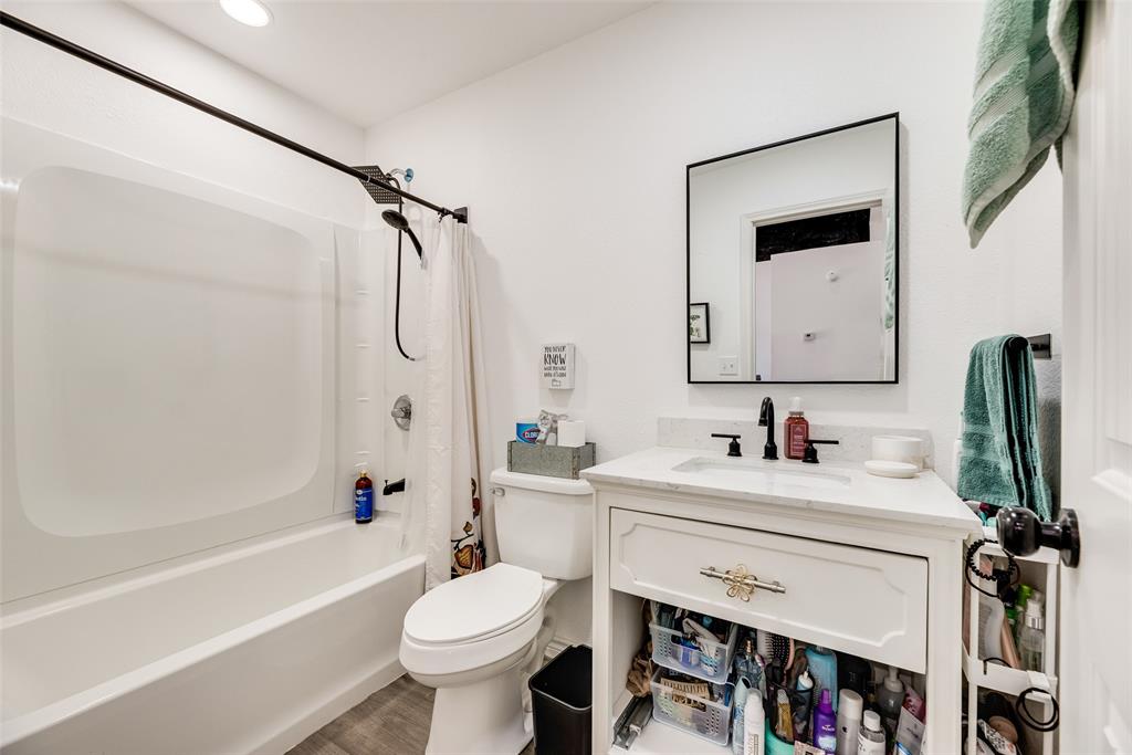 1624 Cemetery Road Royse City, TX 75189 - Photo 24 of 40 a bathroom with a sink toilet and shower