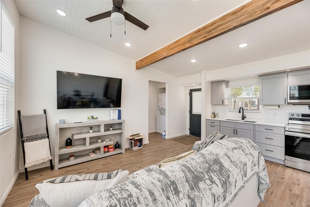 1624 Cemetery Road Royse City, TX 75189 - Photo 27 of 40 a bedroom with furniture and a flat screen tv