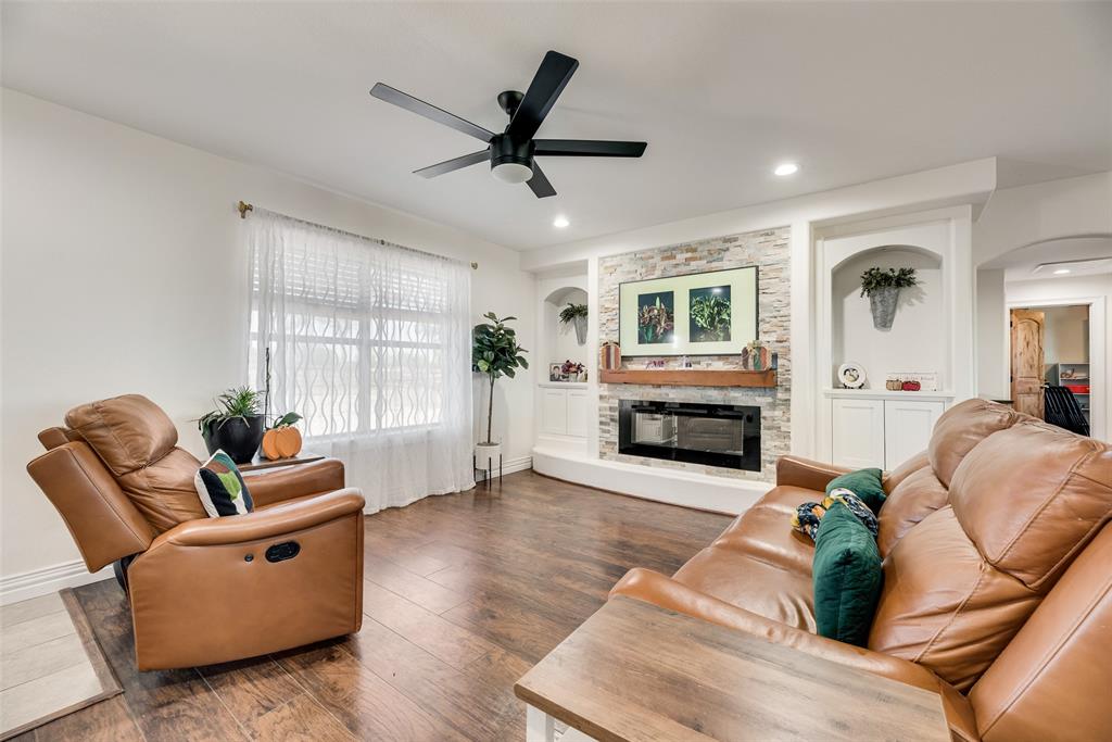 1624 Cemetery Road Royse City, TX 75189 - Photo 4 of 40 a living room with furniture and a fireplace