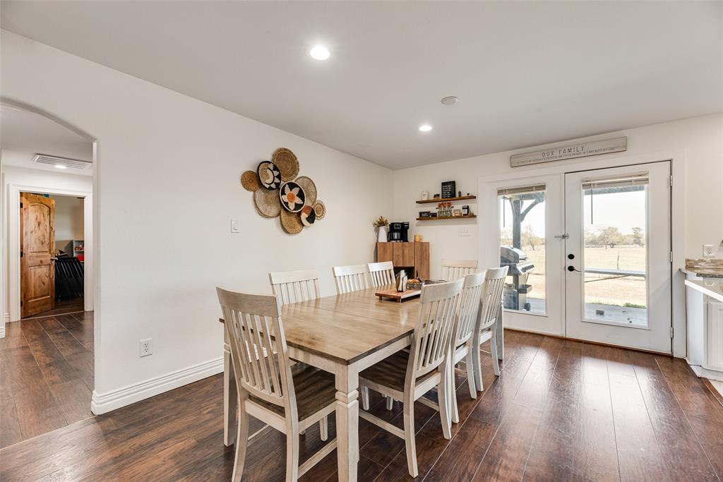 1624 Cemetery Road Royse City, TX 75189 - Photo 6 of 40 a view of a dining room with furniture and wooden floor