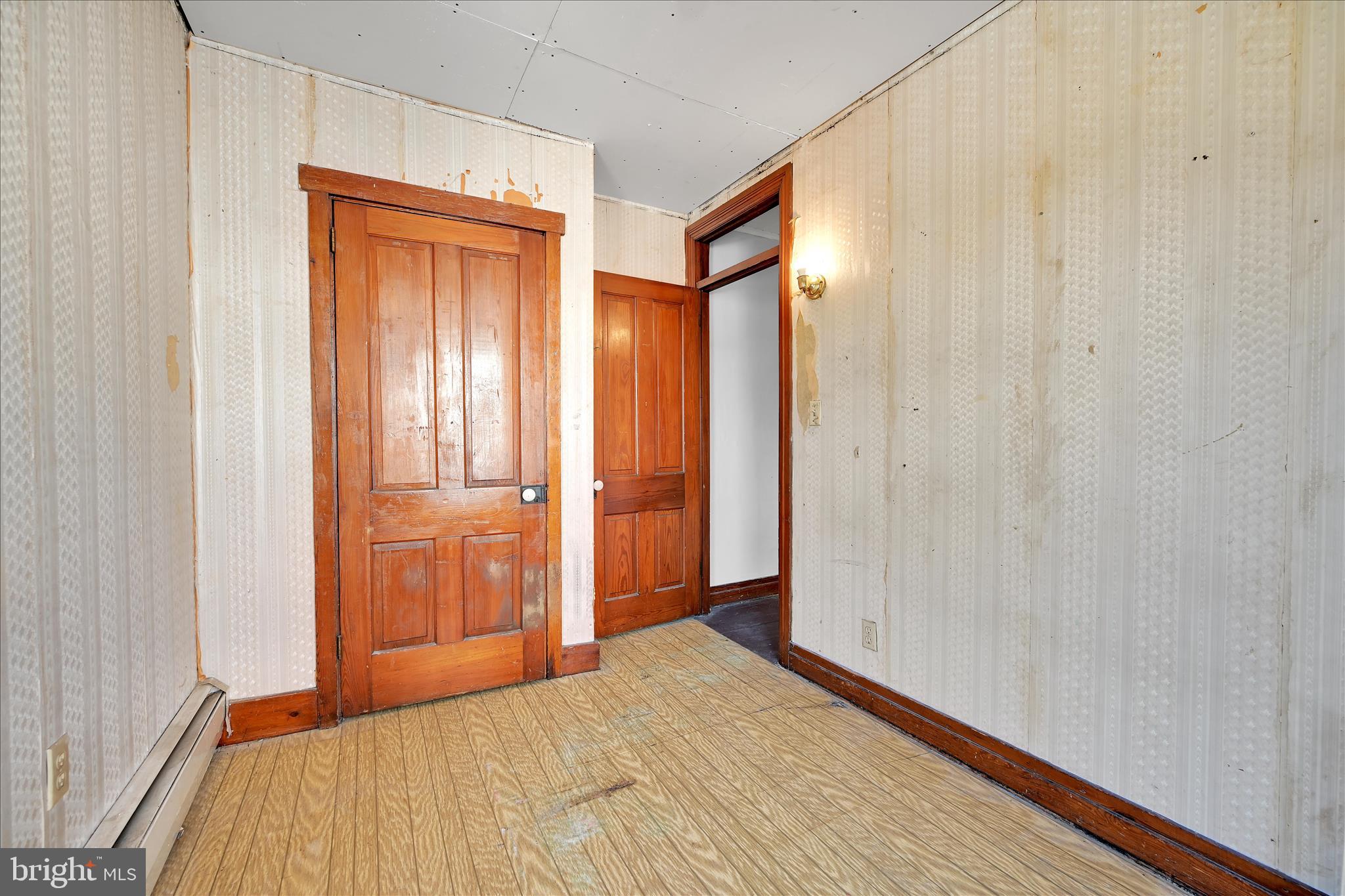 61 Mifflin Street Pine Grove, PA 17963 - Photo 16 of 31 a view of a room with wooden floor and mirror