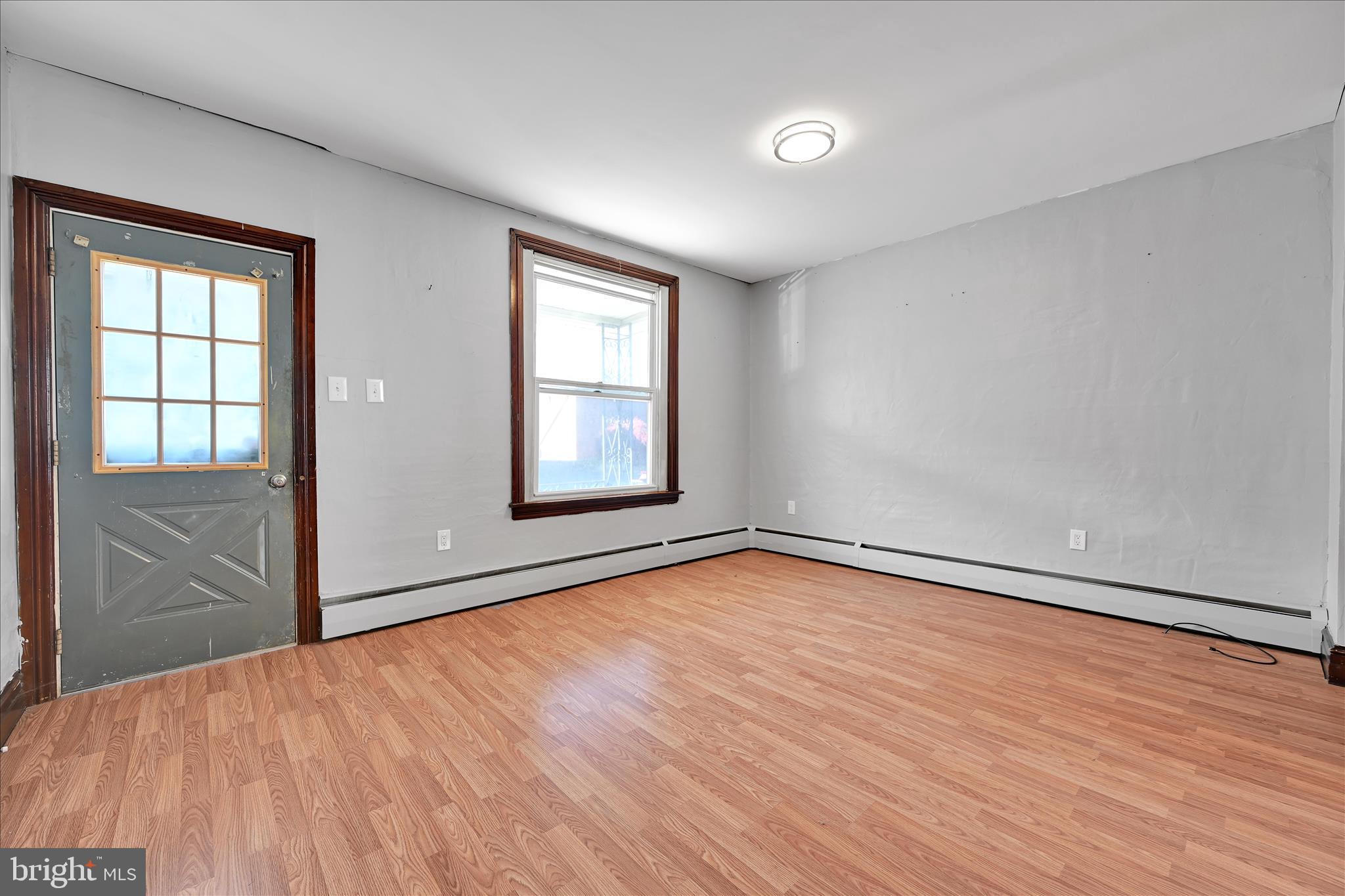 61 Mifflin Street Pine Grove, PA 17963 - Photo 7 of 31 wooden floor in an empty room with a window