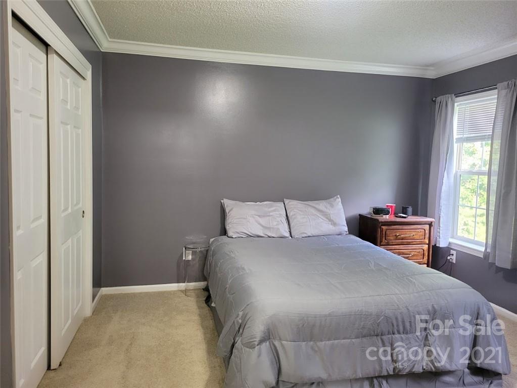 212 Hatchway Road, Unit A & B Indian Land, SC 29707 - Photo 11 of 27 a bedroom with a bed and a window