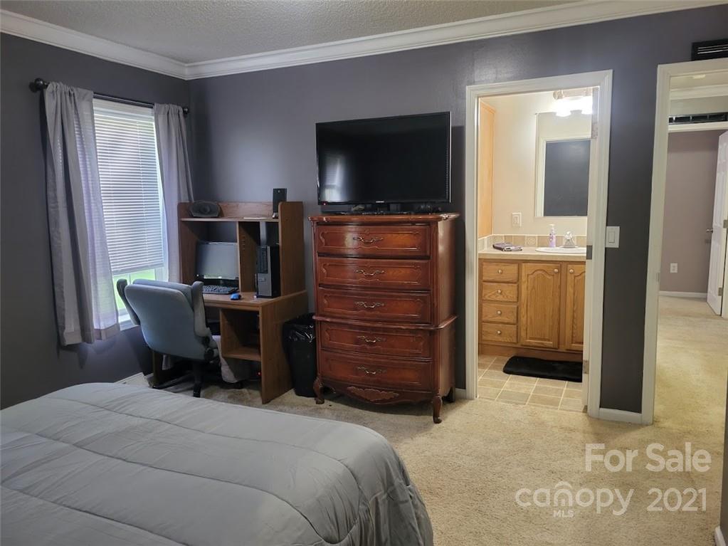 212 Hatchway Road, Unit A & B Indian Land, SC 29707 - Photo 12 of 27 a bedroom with a bed and furniture