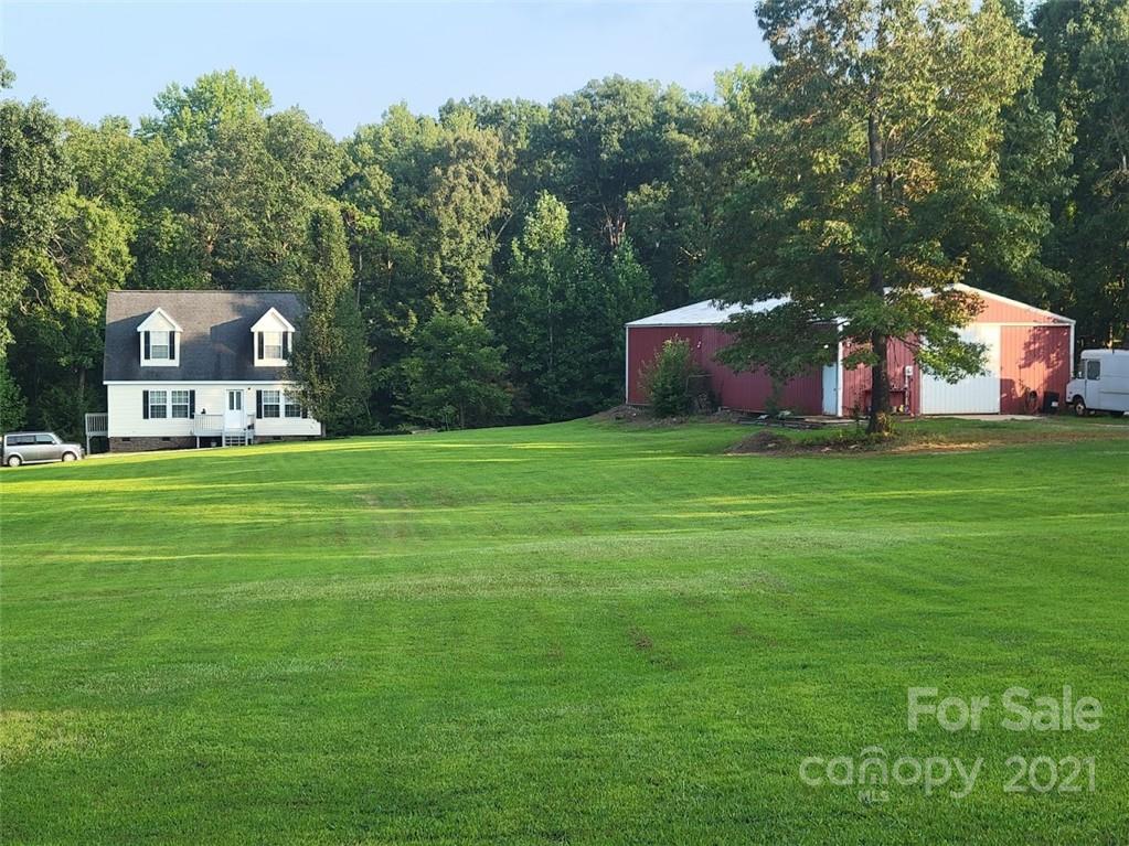 212 Hatchway Road, Unit A & B Indian Land, SC 29707 - Photo 20 of 27 a front view of a house with a yard