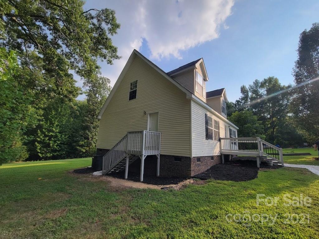 212 Hatchway Road, Unit A & B Indian Land, SC 29707 - Photo 2 of 27 a view of house with backyard