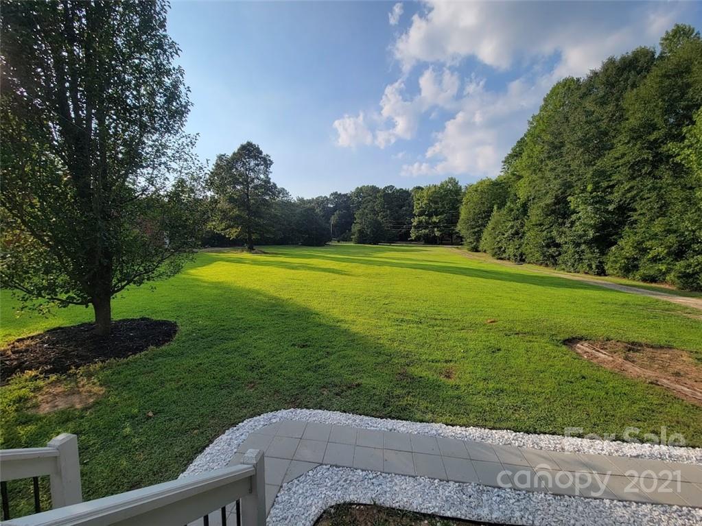 212 Hatchway Road, Unit A & B Indian Land, SC 29707 - Photo 23 of 27 a view of a golf course with a garden