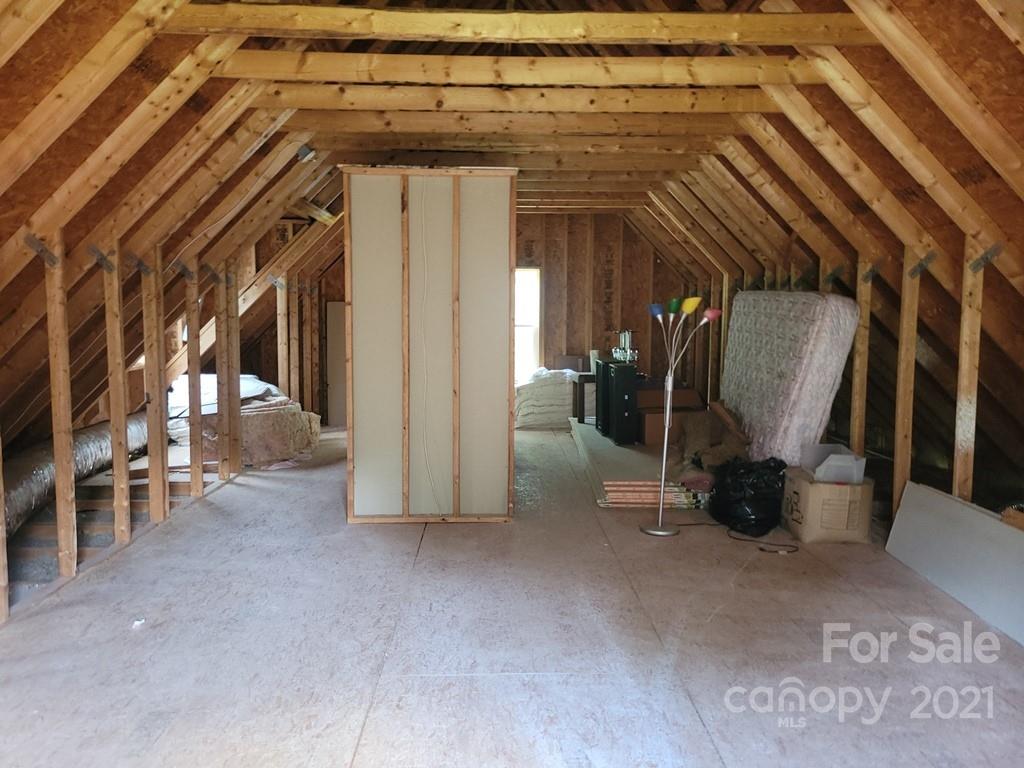 212 Hatchway Road, Unit A & B Indian Land, SC 29707 - Photo 26 of 27 a view of a hallway with wooden shelves
