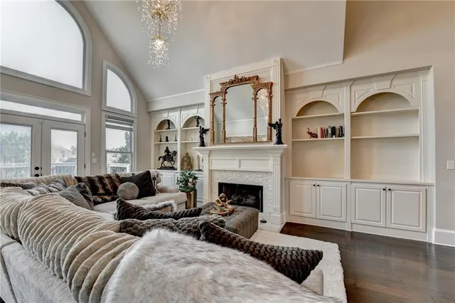 a bathroom with a toilet a sink and a mirror