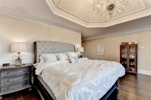 a view of a yard with large trees