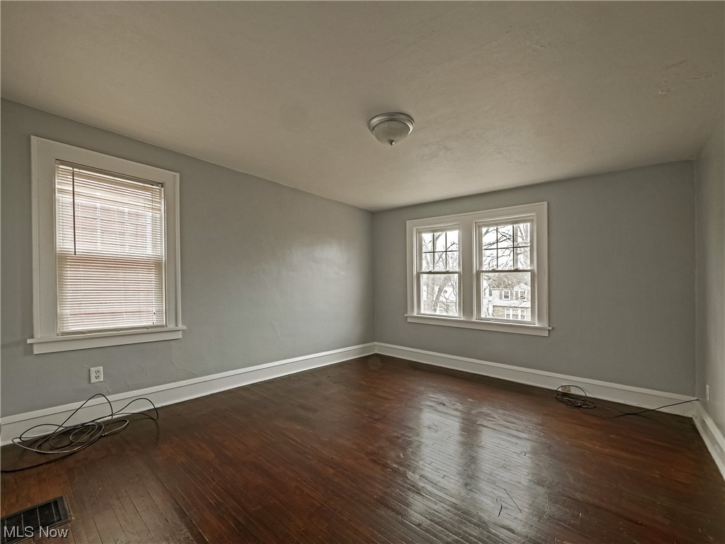 1007 Rushleigh Road Cleveland Heights, OH 44121 - Photo 12 of 22 Master bedroom dark wood