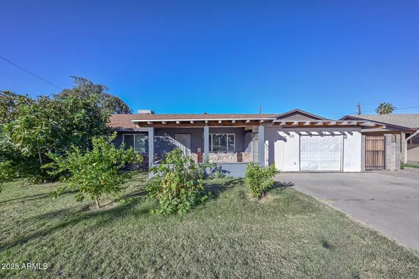 front view of a house with a street