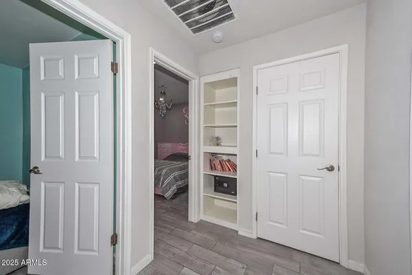 an entryway with a workspace