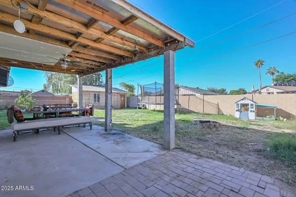 a view of a backyard with plants