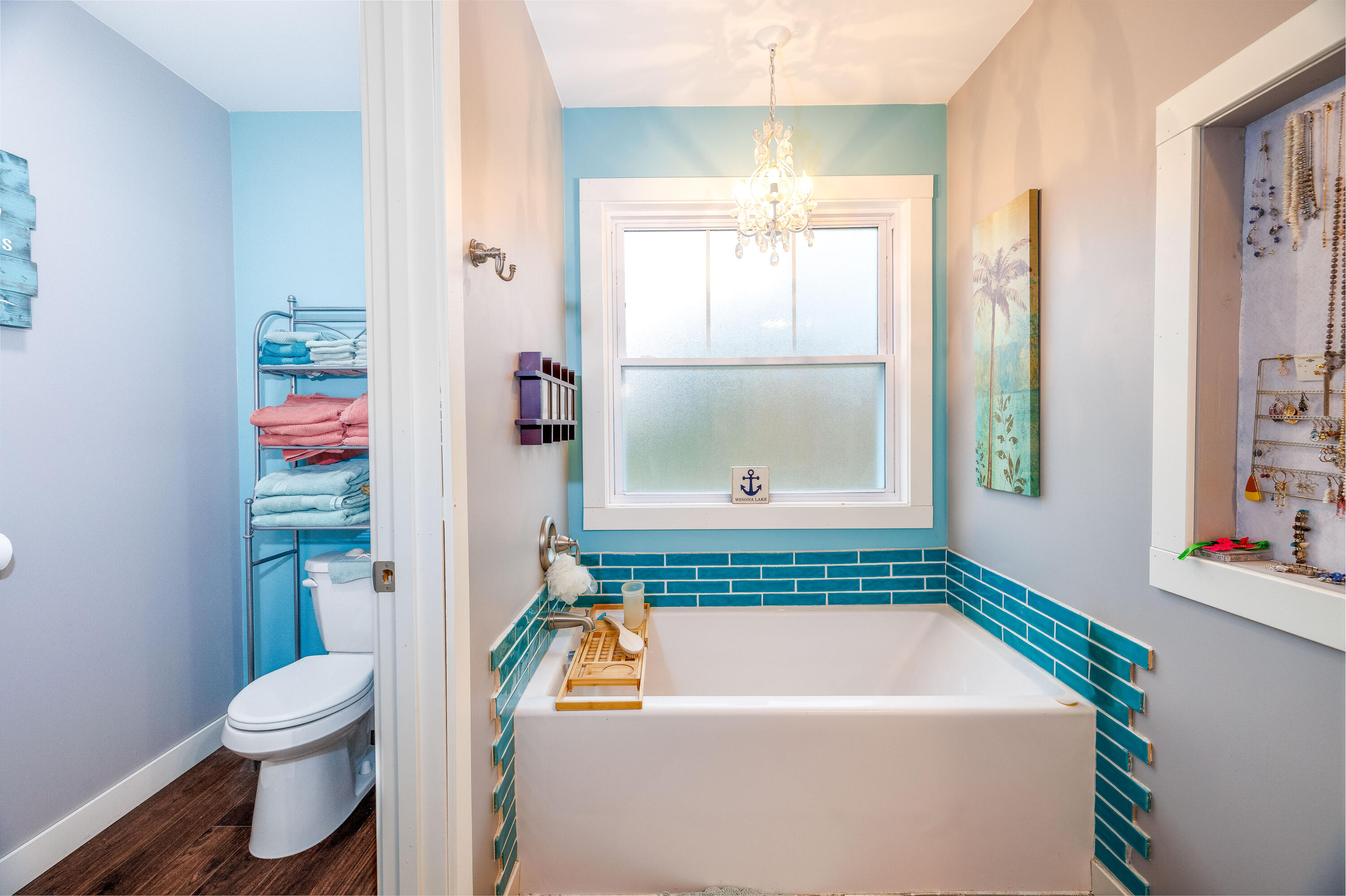 6795 Whispering Woods Drive Demotte, IN 46310 - Photo 36 of 64 a bathroom with a bathtub and a toilet