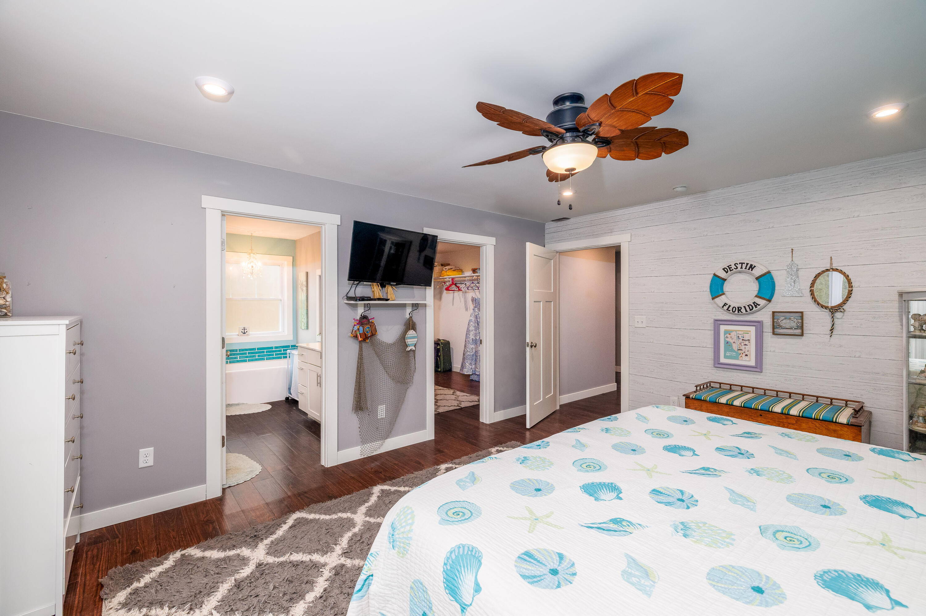 6795 Whispering Woods Drive Demotte, IN 46310 - Photo 40 of 64 a bedroom with a bed and a chandelier