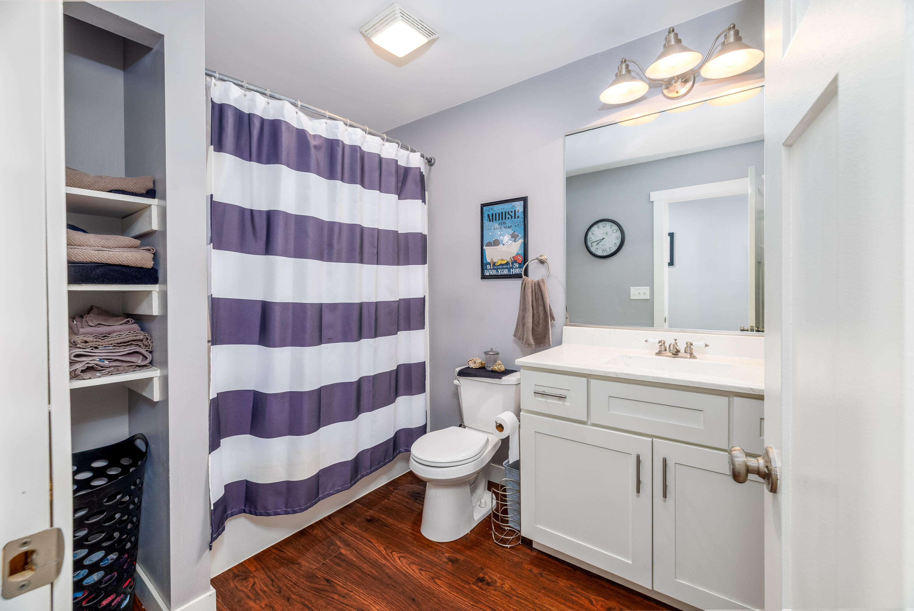 6795 Whispering Woods Drive Demotte, IN 46310 - Photo 44 of 64 a bathroom with a sink a toilet and shower